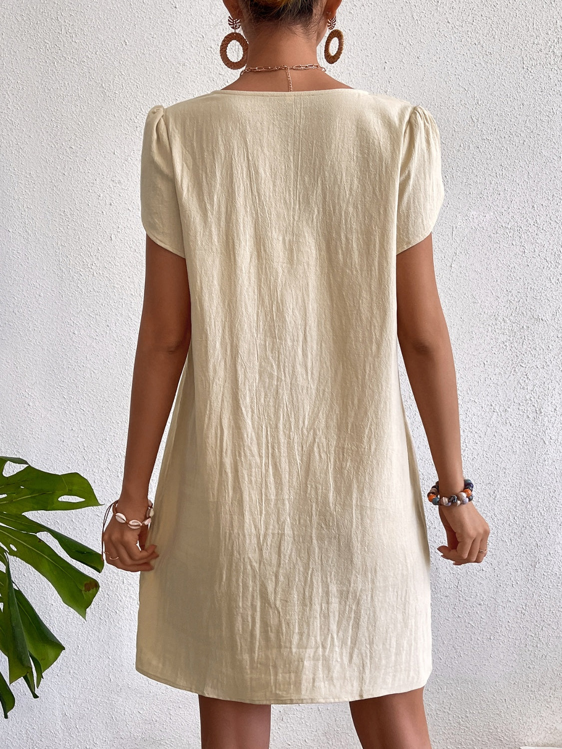 Jersey-Inspired Asymmetrical Button Dress